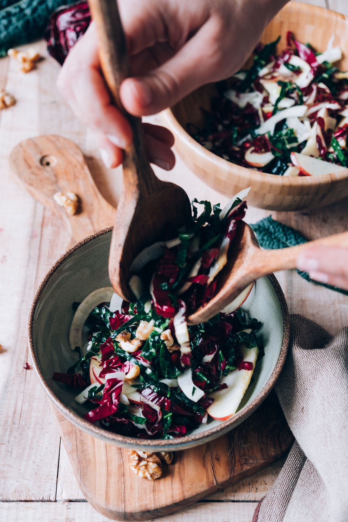 Delicious salad with kale, radicchio, walnuts, apple, fennel and pomegranate